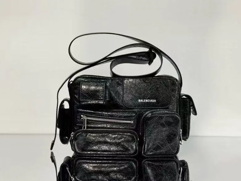 Balenciaga crossbody bag in black caviar-grained leather with a long strap and silver hardware