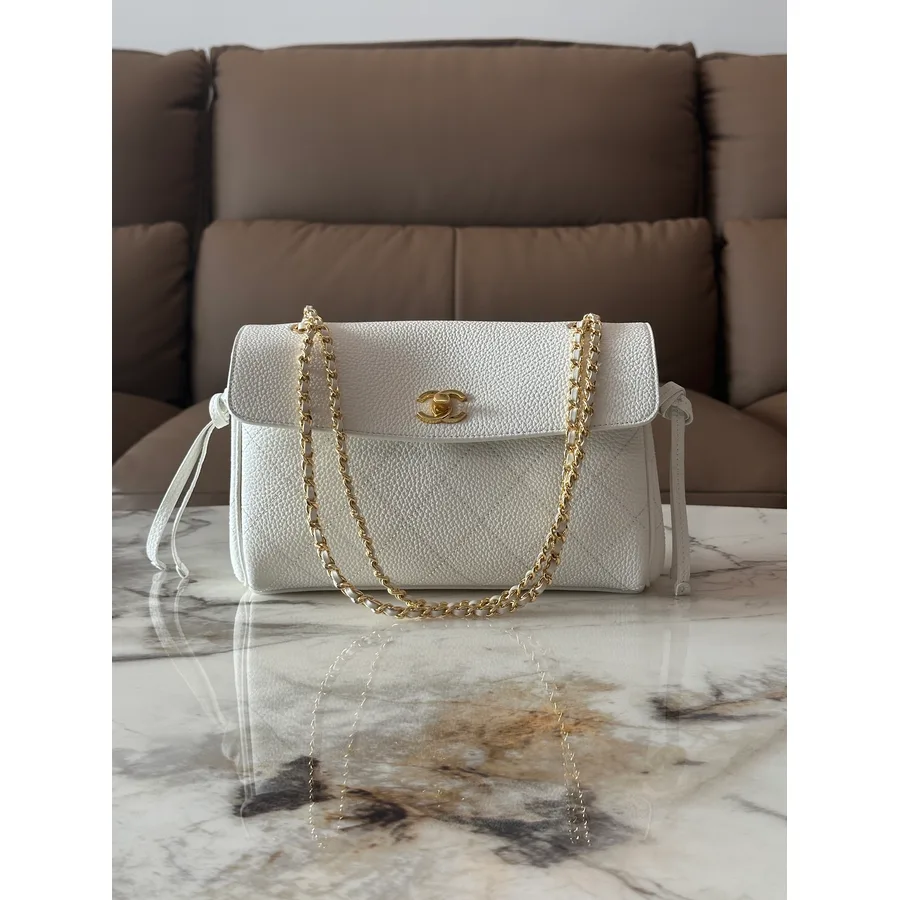Chanel white caviar-grained leather mini bag catalog photo