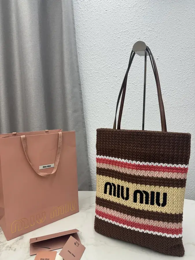 Miu Miu brown woven straw tote bag catalog photo