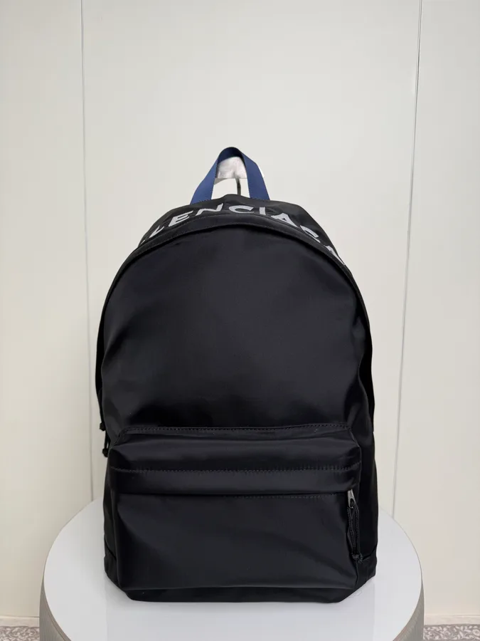 Balenciaga travel backpack in black nylon with a zipped front pocket and adjustable shoulder straps