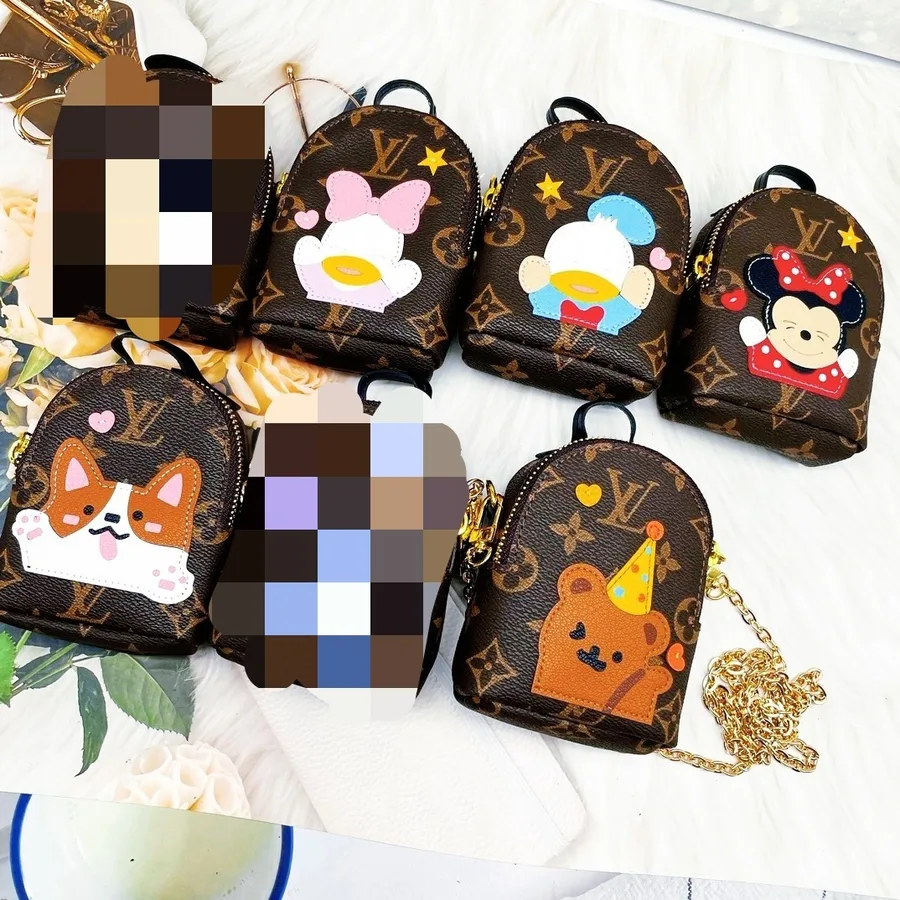 Bolso de viaje Louis Vuitton en lona marrón con asas y correa