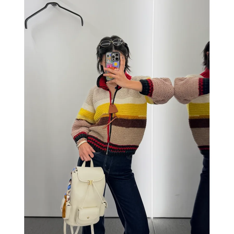 Louis Vuitton cream leather travel bag catalog photo