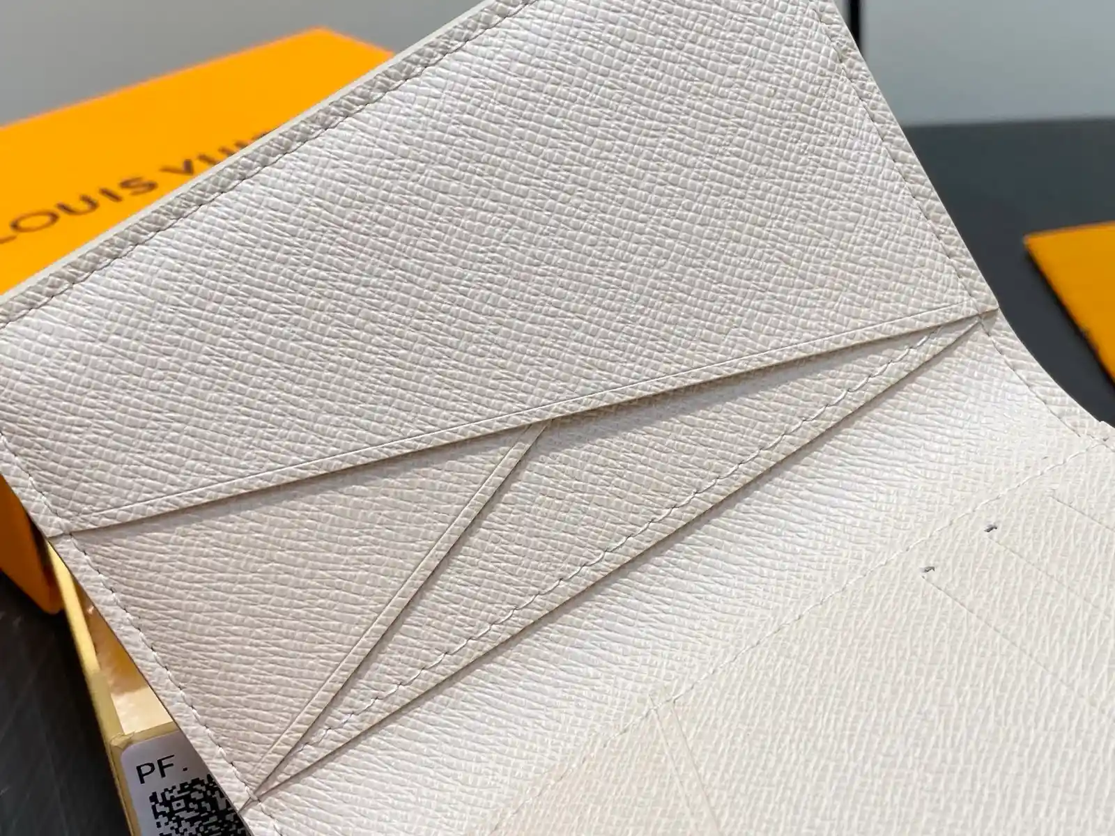 Louis Vuitton cream calfskin wallet catalog photo