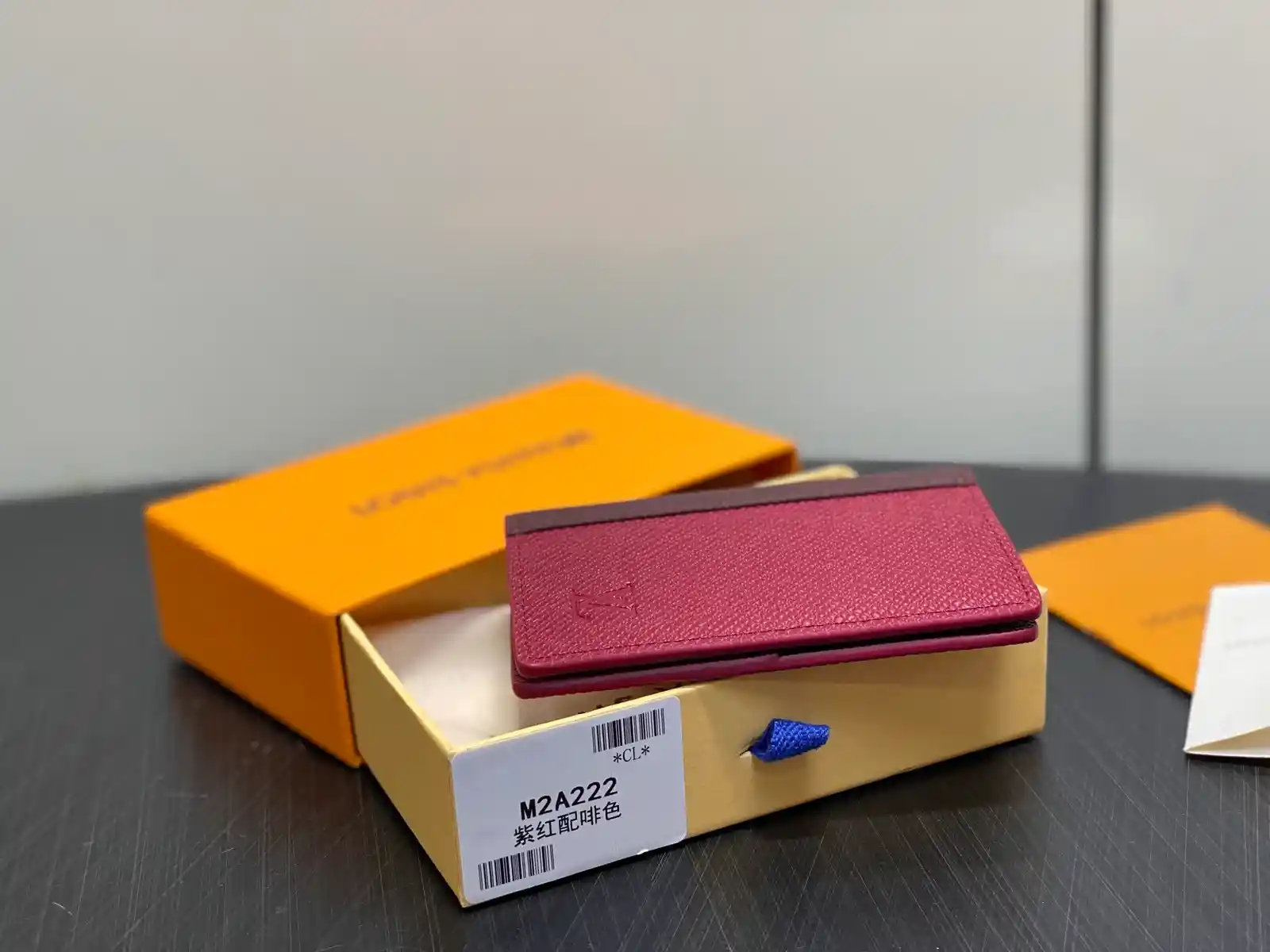 Louis Vuitton burgundy caviar-grained leather wallet catalog photo
