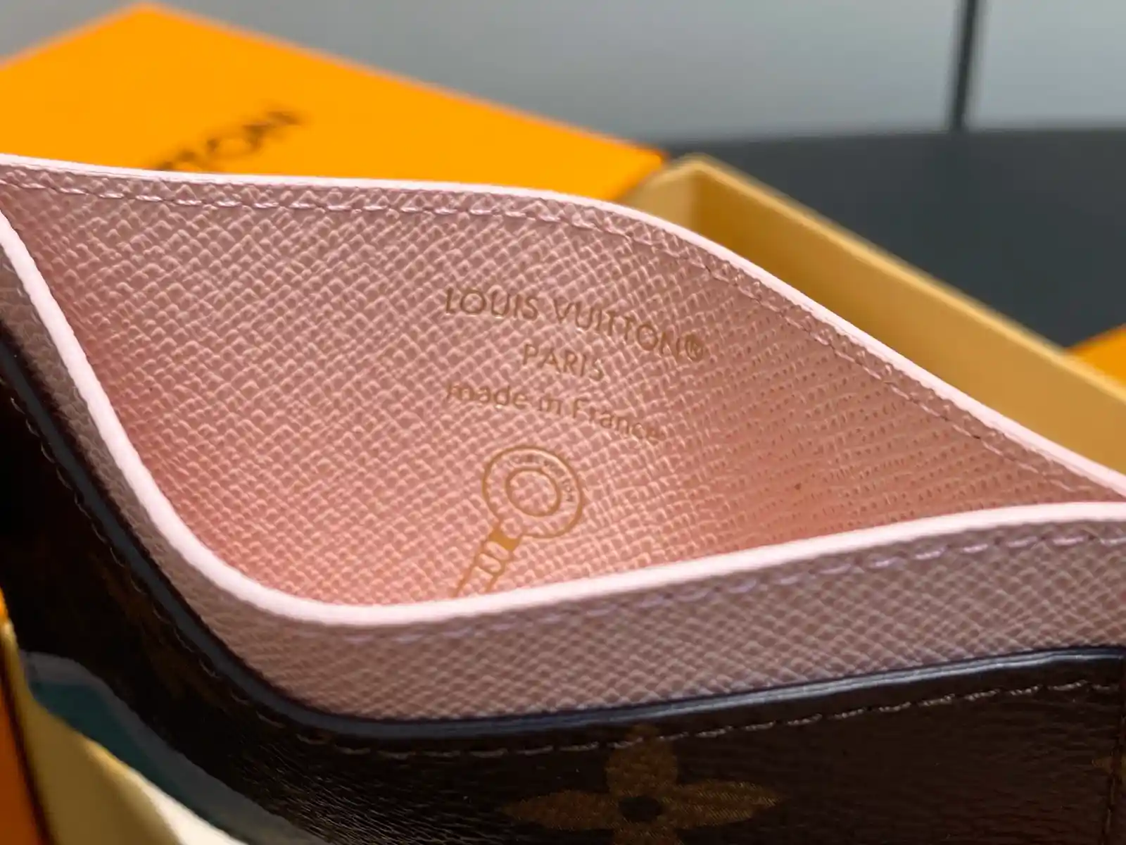 Louis Vuitton pink caviar-grained leather wallet catalog photo
