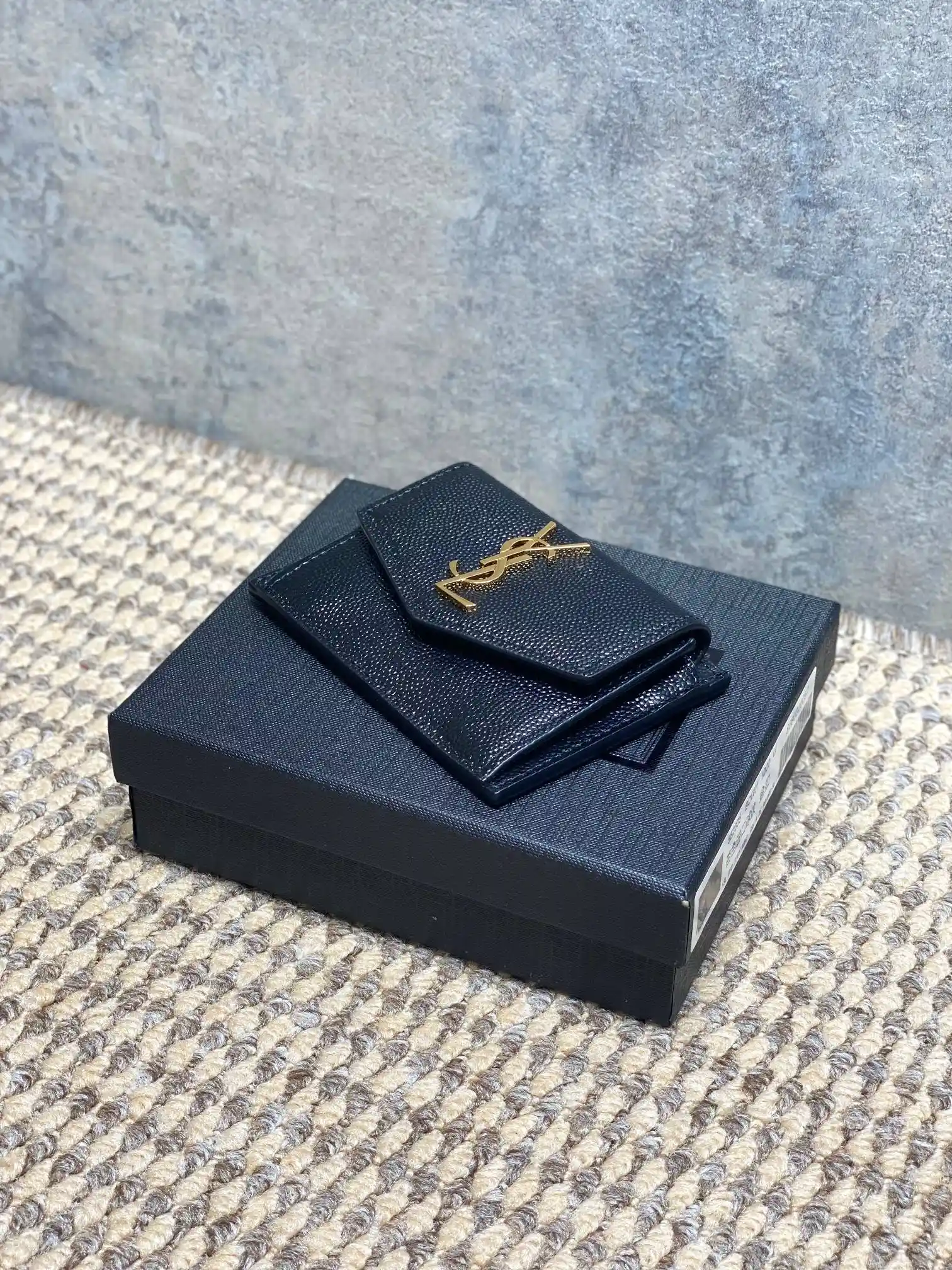Saint Laurent black caviar-grained leather wallet catalog photo