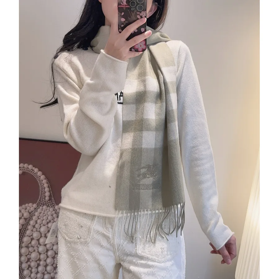 Burberry cream accessory catalog photo