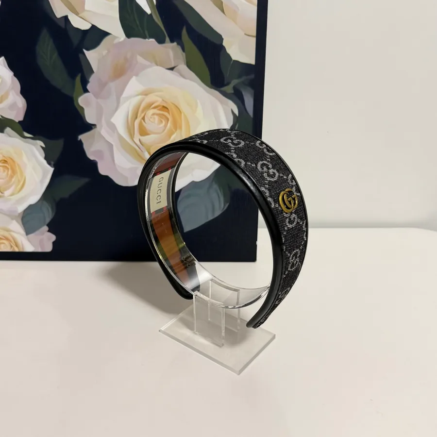 Gucci black canvas accessory catalog photo
