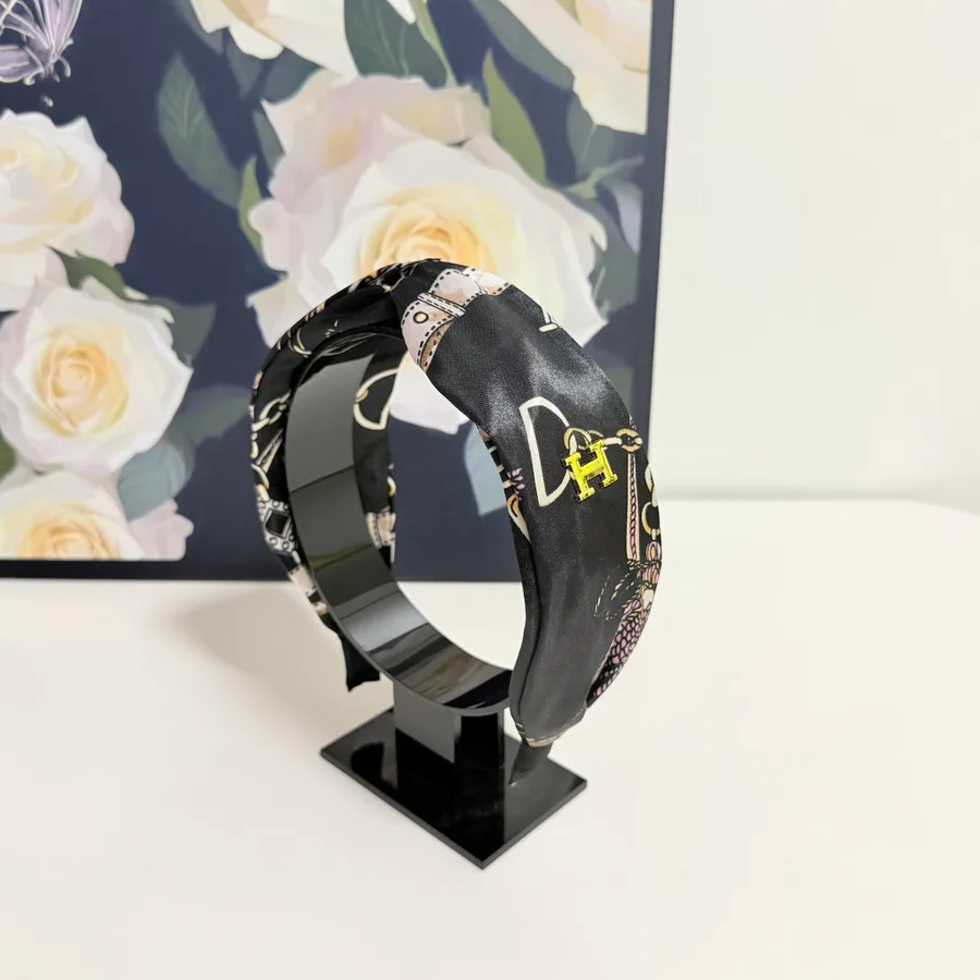 Hermes black accessory catalog photo