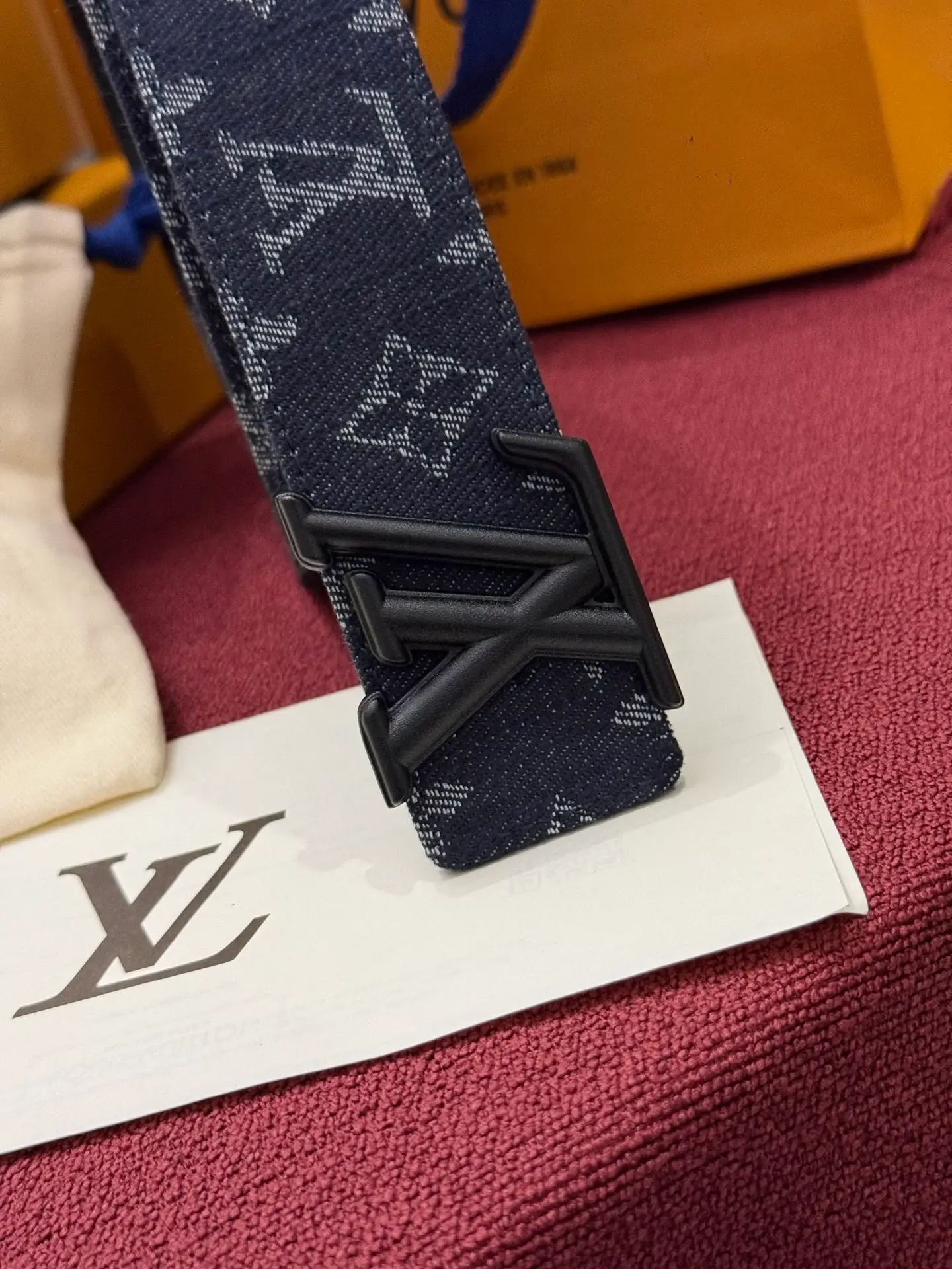 Louis Vuitton navy denim belt catalog photo