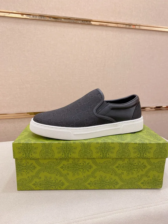 Gucci black canvas shoe catalog photo