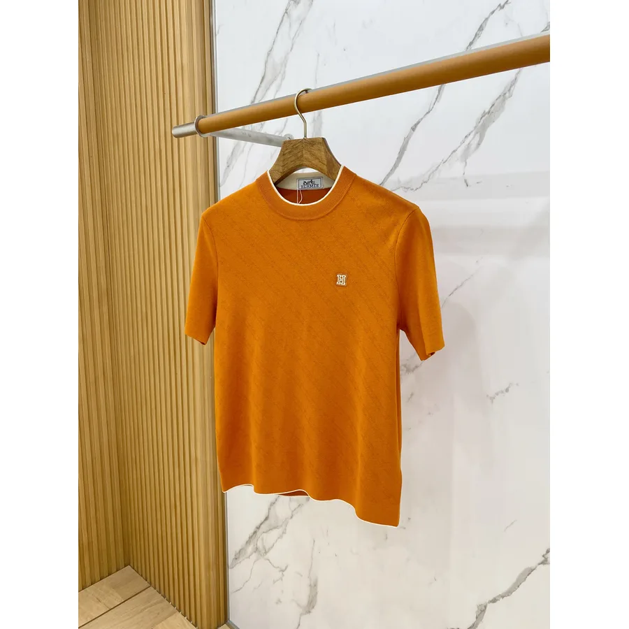 Hermès orange garment — ref 829714