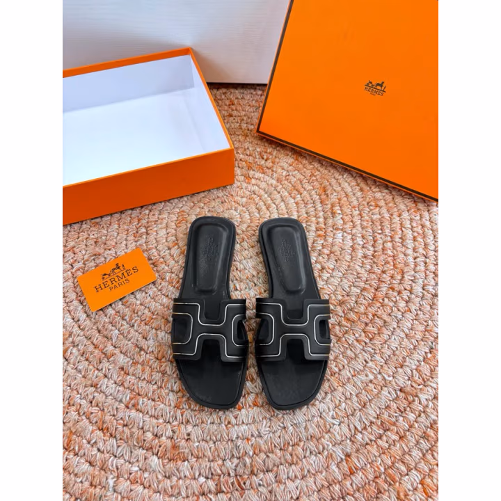 Hermès black slide — ref 775910