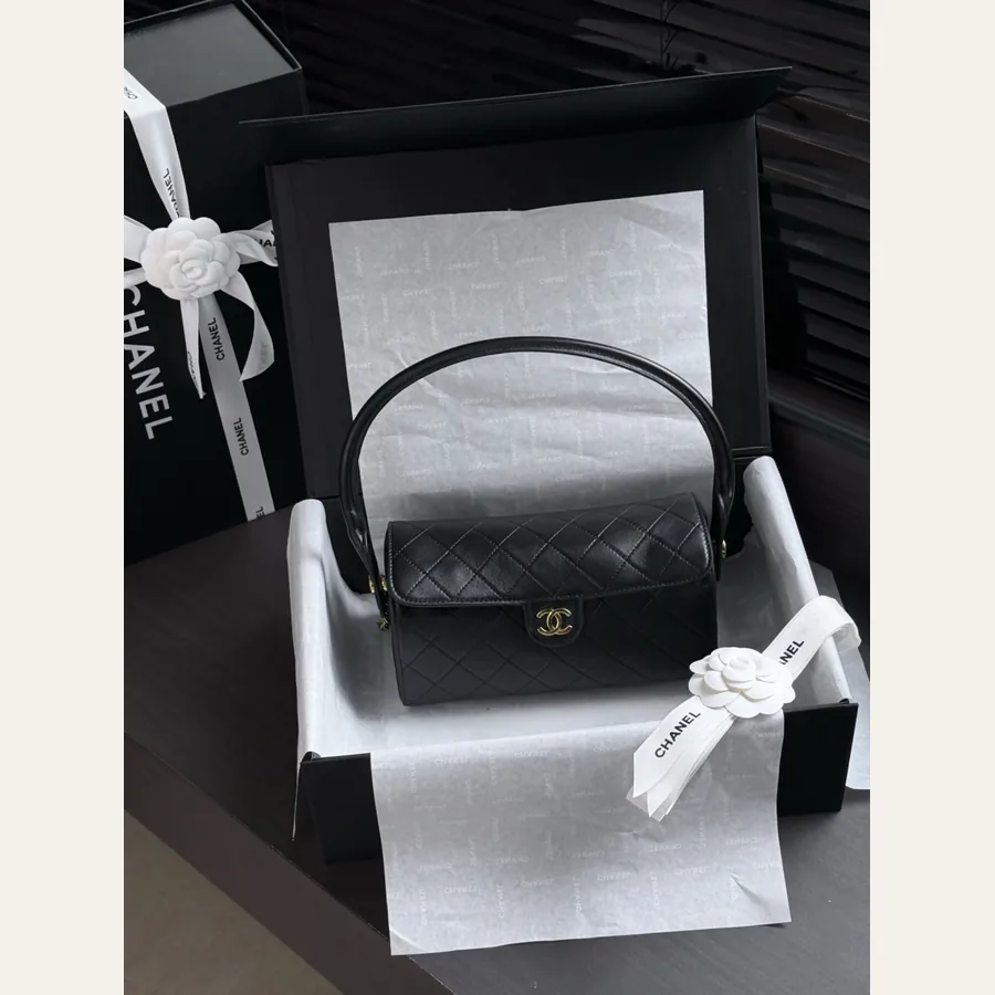 Chanel black quilted bowling bag catalog photo