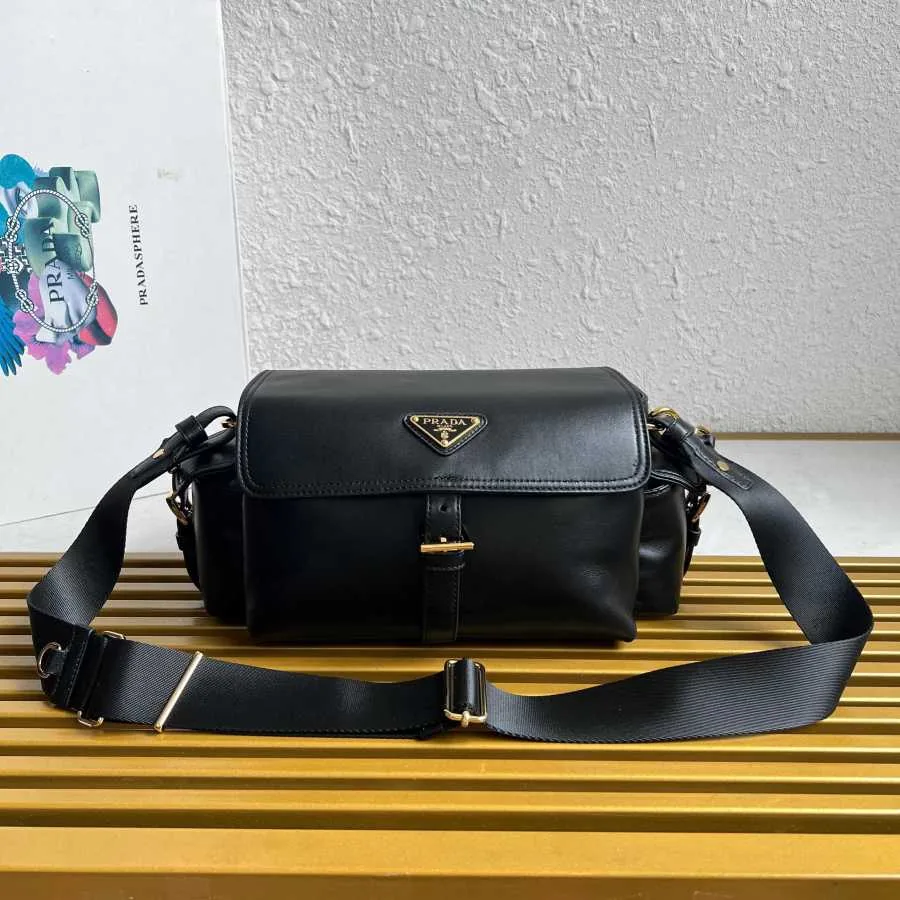Prada Re-Edition-style nylon bag interior and zip-fastened body, side view — catalog reference
