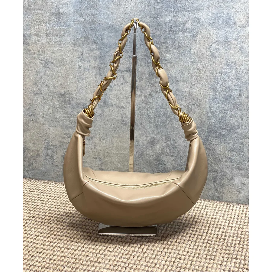 YSL Amalia crescent bag profile catalog photo