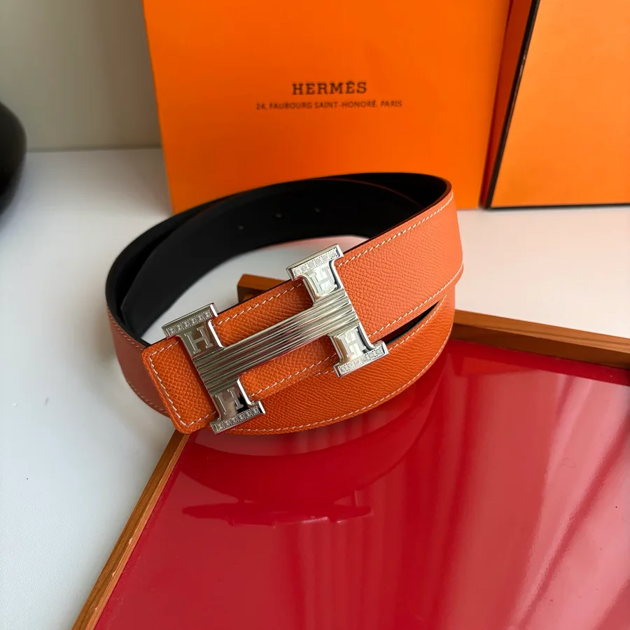 Hermès belt in orange calfskin with silver-tone hardware