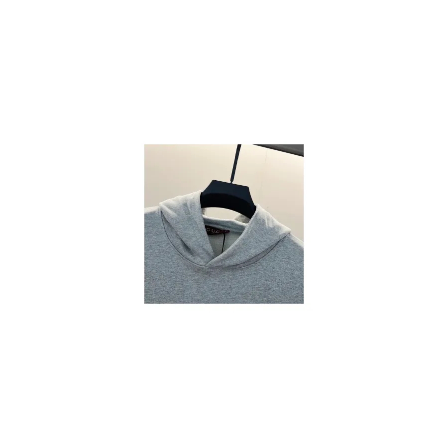 Grey Gucci hooded sweatshirt on a hanger, fixed hood with drawstring and ribbed cuffs and hem visible