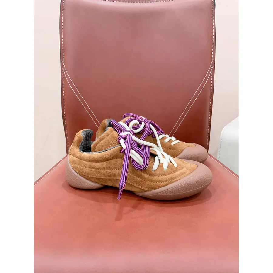Tan brown suede McQueen-style chunky low-top with stitched wavy panels, padded collar and purple-and-white rope laces, from the GunongTrade shoes album