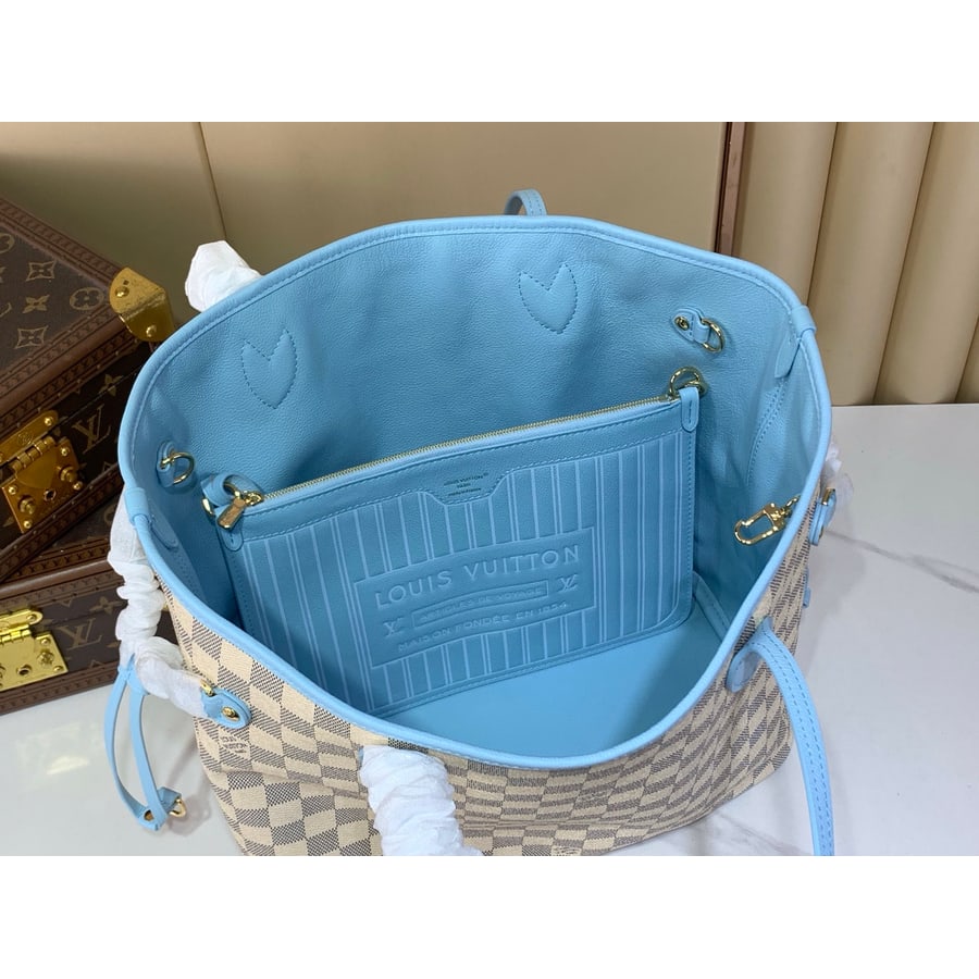Interior of a Damier Neverfull-style tote with pale blue lining, a zip pocket with an embossed flap and a matching pouch inside