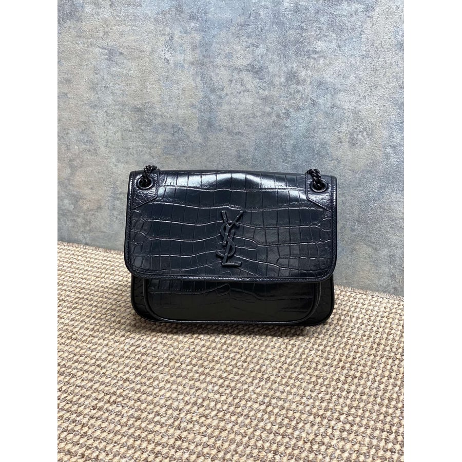 Saint Laurent Niki catalog photo, album reference 770771